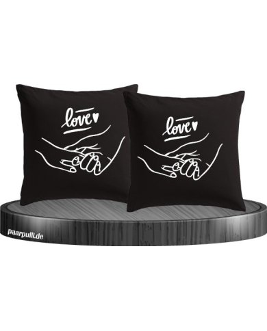 Kissenbezüge mit Love Aufschrift und Hände haltendes Design. Set Kissenbezüge mit Love Aufschrift und Hände haltendes Design. Set